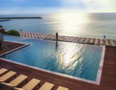 Dachpool mit Blick auf Strand und Meer vom Grifid Hotel Encanto Beach MEDI SPA